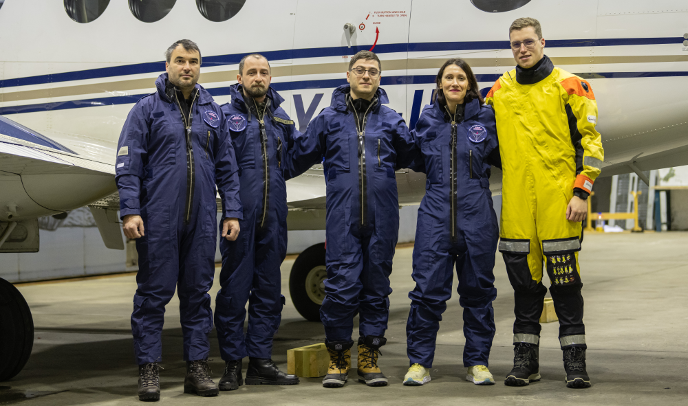 Research-flights from Andøya, Northern Norway: The crew of two pilots and two operators from INCAS - National Institute for Aerospace Research/ Romania, and Professor Trude Storelvmo, University of Oslo as number four from left. The picture is taken before a research-flight in February 2023 in conjunction with the MC2 project at Hangar B, Andøya Flystasjon. Photo: Private