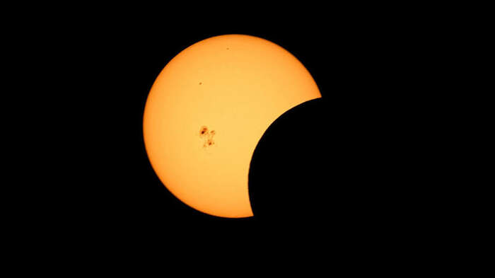Image may contain: Orange, Astronomical object, Moon, Celestial event, Astronomy.