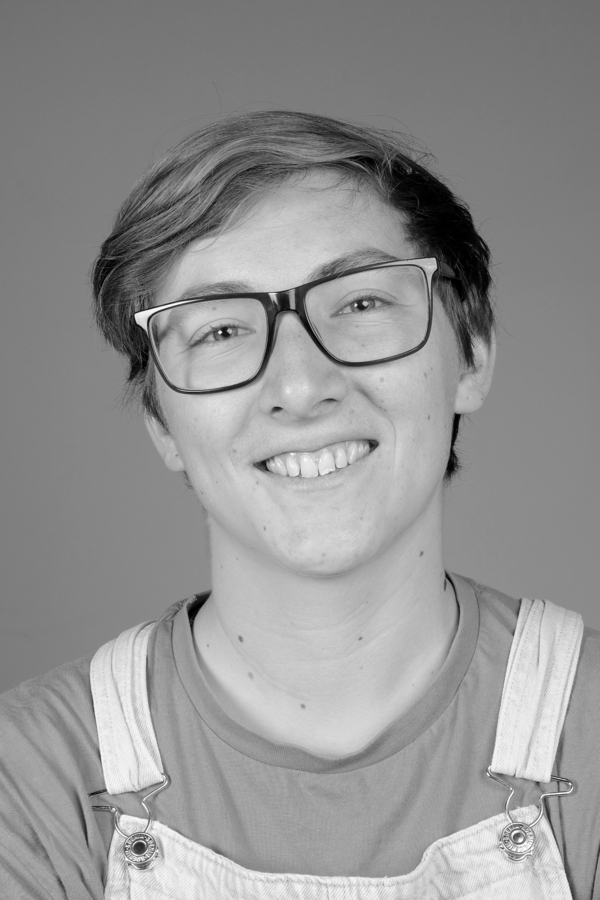 Portrait photo of a young person with glasses