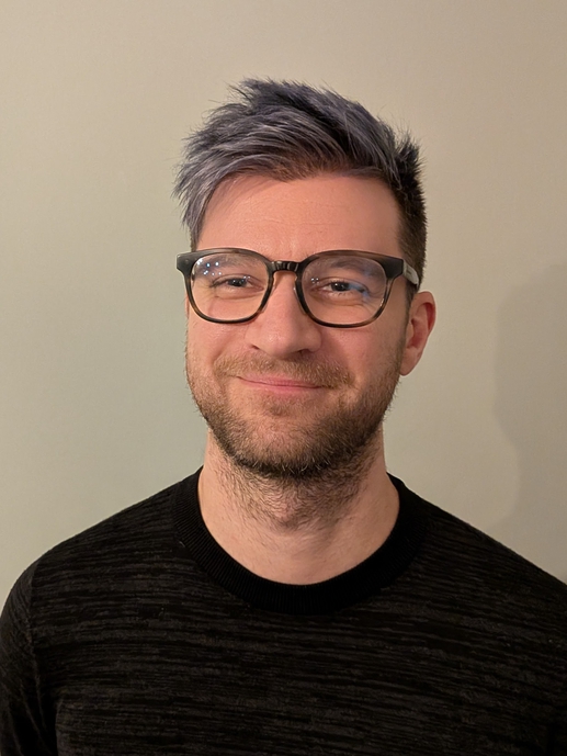 Portrait photo of a man smiling