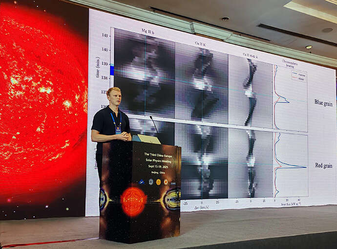 Young ph.d. student doing a talk at a conference