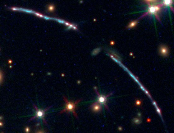image showing a gravitational lensed galaxy cluster 