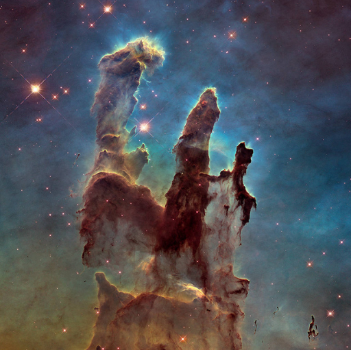 photo of the pillars of creation, stellar nurseries made of dust and gas.