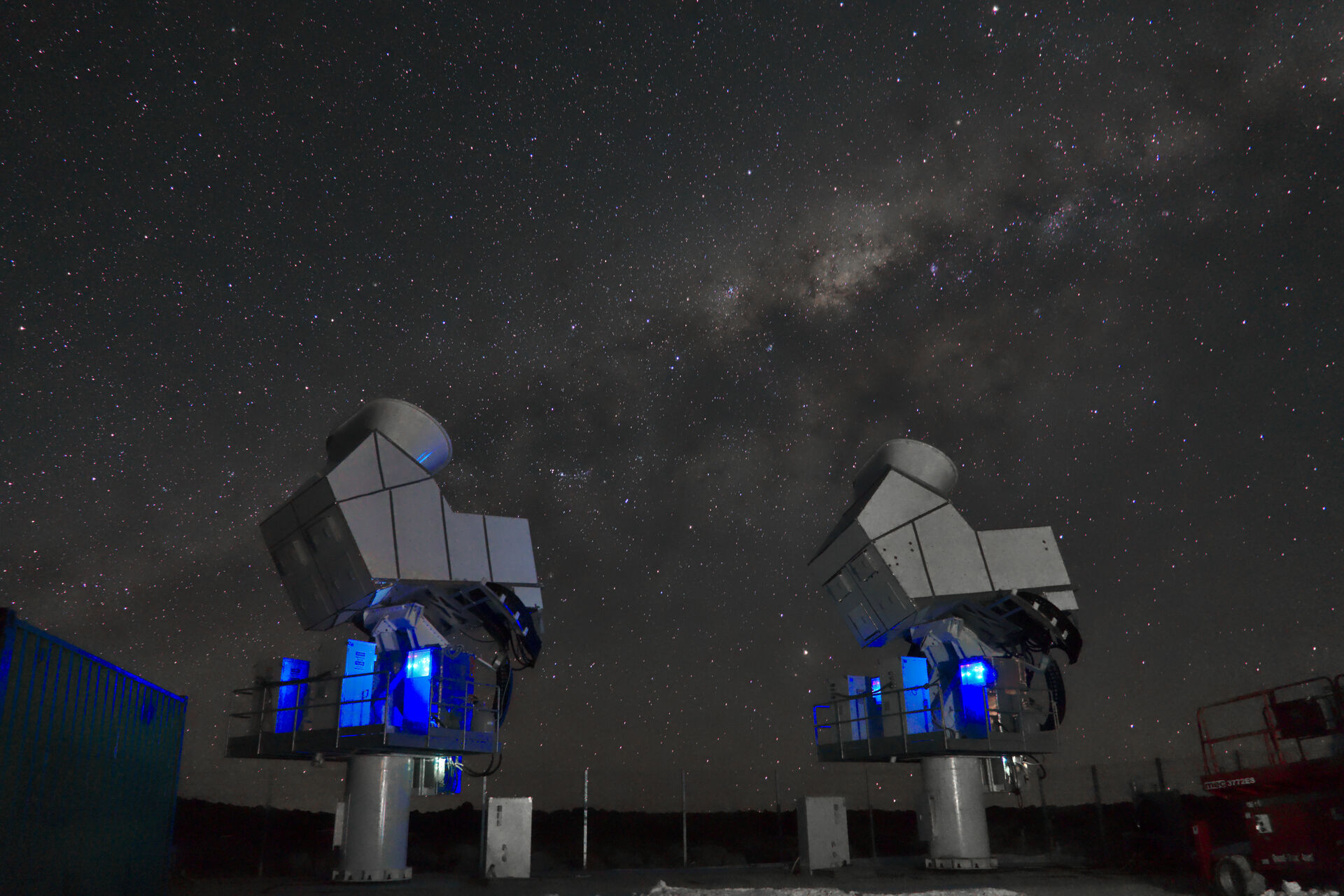 dark starry sky and telescopes