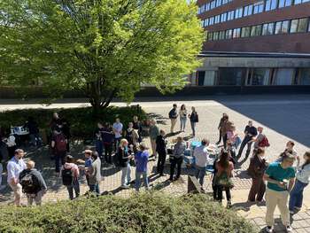 Image may contain: Public space, Jeans, Community, Crowd, Pedestrian.