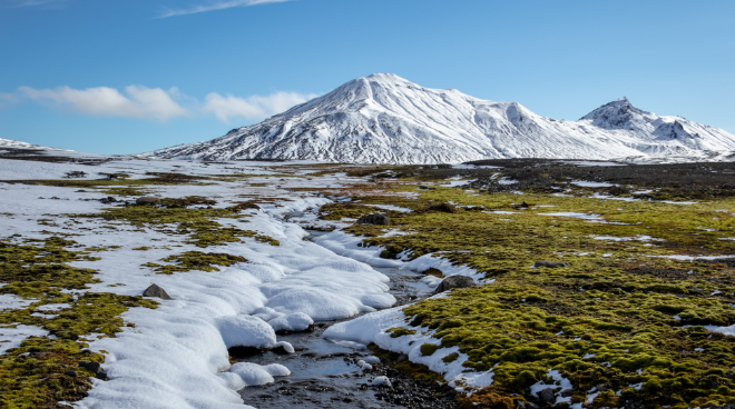 landscape photo of snow covered mountain under cloudy sky