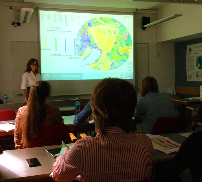 Photo 4. Caption: Dr Carmen Gaina delivering a lecture on Arctic geology and geophysics. Photo: Yunfeng Bai.