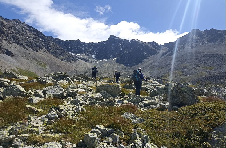 Image may contain: Cloud, Sky, Mountain, Plant, People in nature.