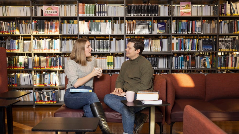 Two people talking together