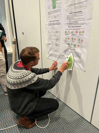 Marcus preparing his poster for the BioCat-conference in Tromsø, June 2023.
