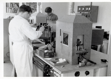 Figure 3. Optical spectral analysis. Alf Follo is handling the instrument at Statens Råstofflaboratorium.