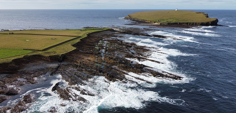 Photo: The coast of the Orkney Islands with middle Paleozoic rocks, one of the targets of PANDA.  Photo: Simon Lloyd