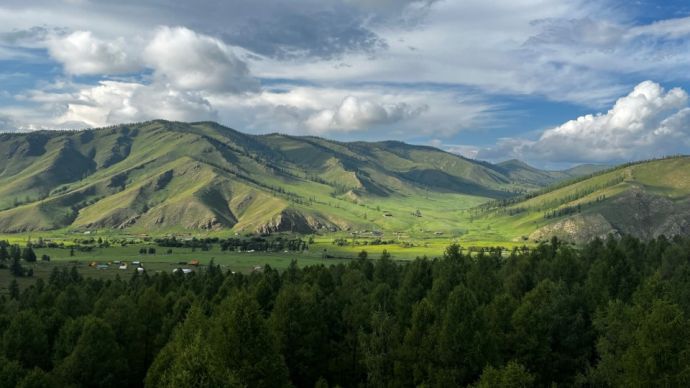 Typical Mongolian landscape with forests and permafrost on north-facing slopes, while south-facing slopes have grazed grasslands and are permafrost-free. Credit: Robin B. Zweigel