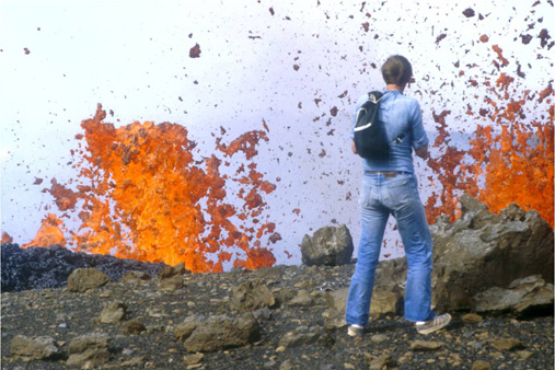Picture of a volcano and a person. Photo: Tom Andersen, University of Oslo