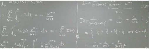 Math equations on black board