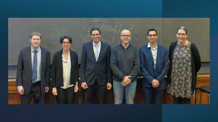 People standing in a row. From left: Researcher Erik Ingemar Tellgren (University of Oslo, Norway), Senior Researcher Ainara Nova Flores (University of Oslo, Norway, PhD Mohamed Eid Ahmed Safy (University of Oslo, Norway), Senior Researcher David Balcells Badia (University of Oslo, Norway), Professor Max Garcia-Melchor (CIC energiGUNE, Spain), and Professor Natalie Fey (University of Bristol, United Kingdom). 