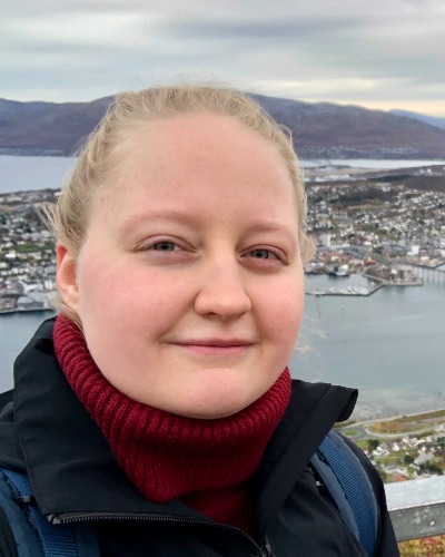 Image may contain: Scarf, Water, Chin, Sky, Cloud.
