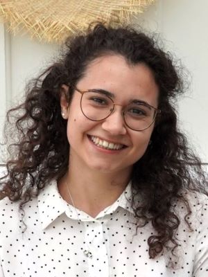 Young female researcher with glasses, portreit photo. 