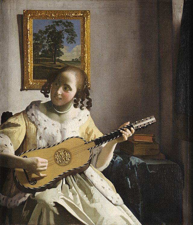 Gitarspilleren malt i ca.1672 av den nederlandske maleren Johannes Vermeer (1632-675). Wikimedia Commens.