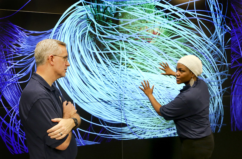 Woman manipulating data visualisation