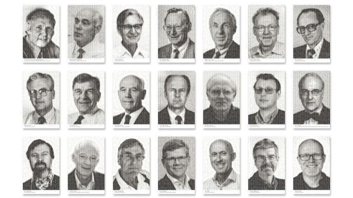 21 portraits in black and white of men.