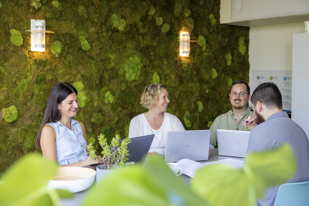 a group of people in dialogue