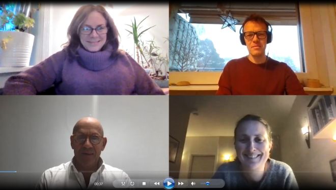 Four people in a zoom-meeting. The screen is split in four parts, showing one person from the shoulders and up in each part of the screen.