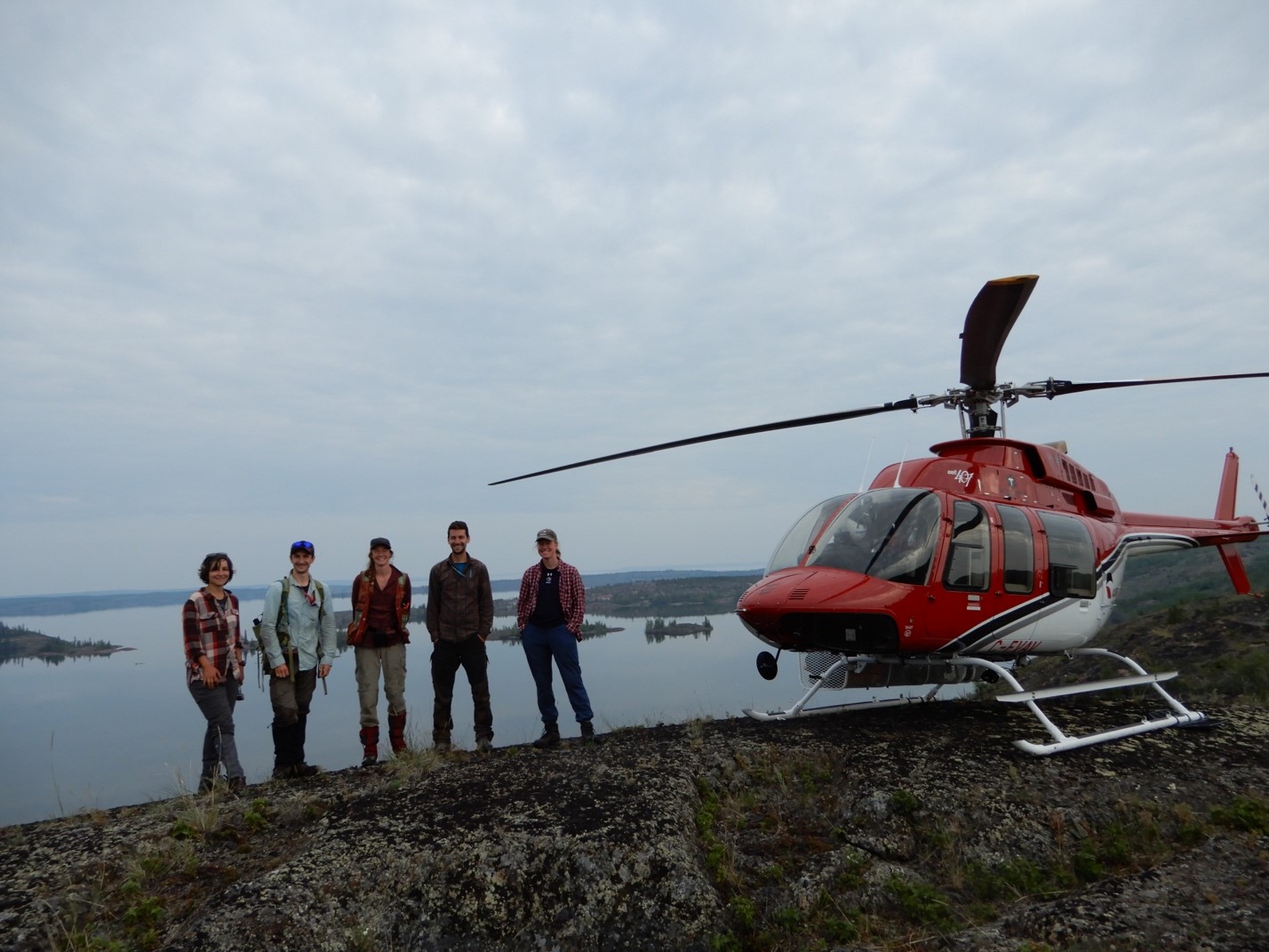 Five people and a helicopter.