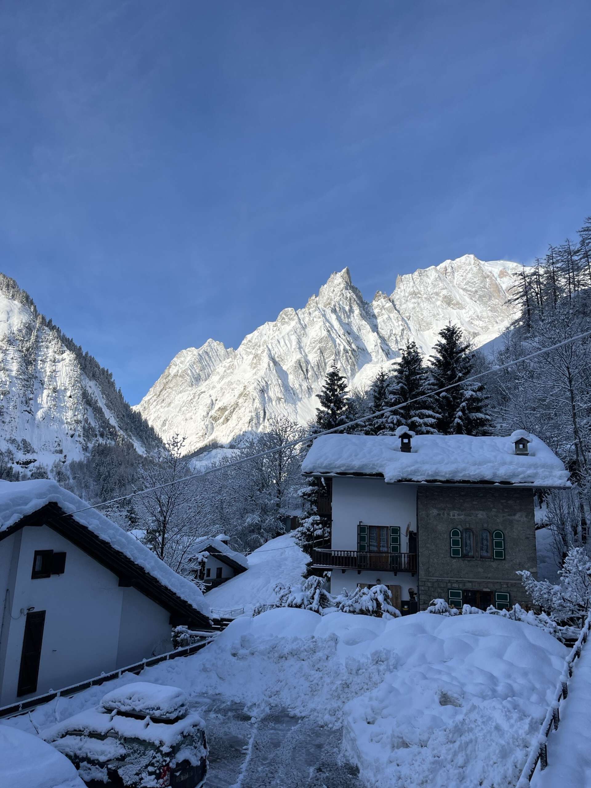 Image may contain: Snow, Winter, Mountain, geological phenomenon, Mountain range.