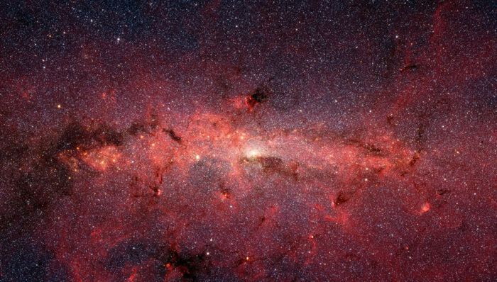 Dette bildet fra NASA viser hvordan det ser ut i midten av vår egen galakse, Melkeveien.  Foto: NASA, JPL-Caltech, Susan Stolovy