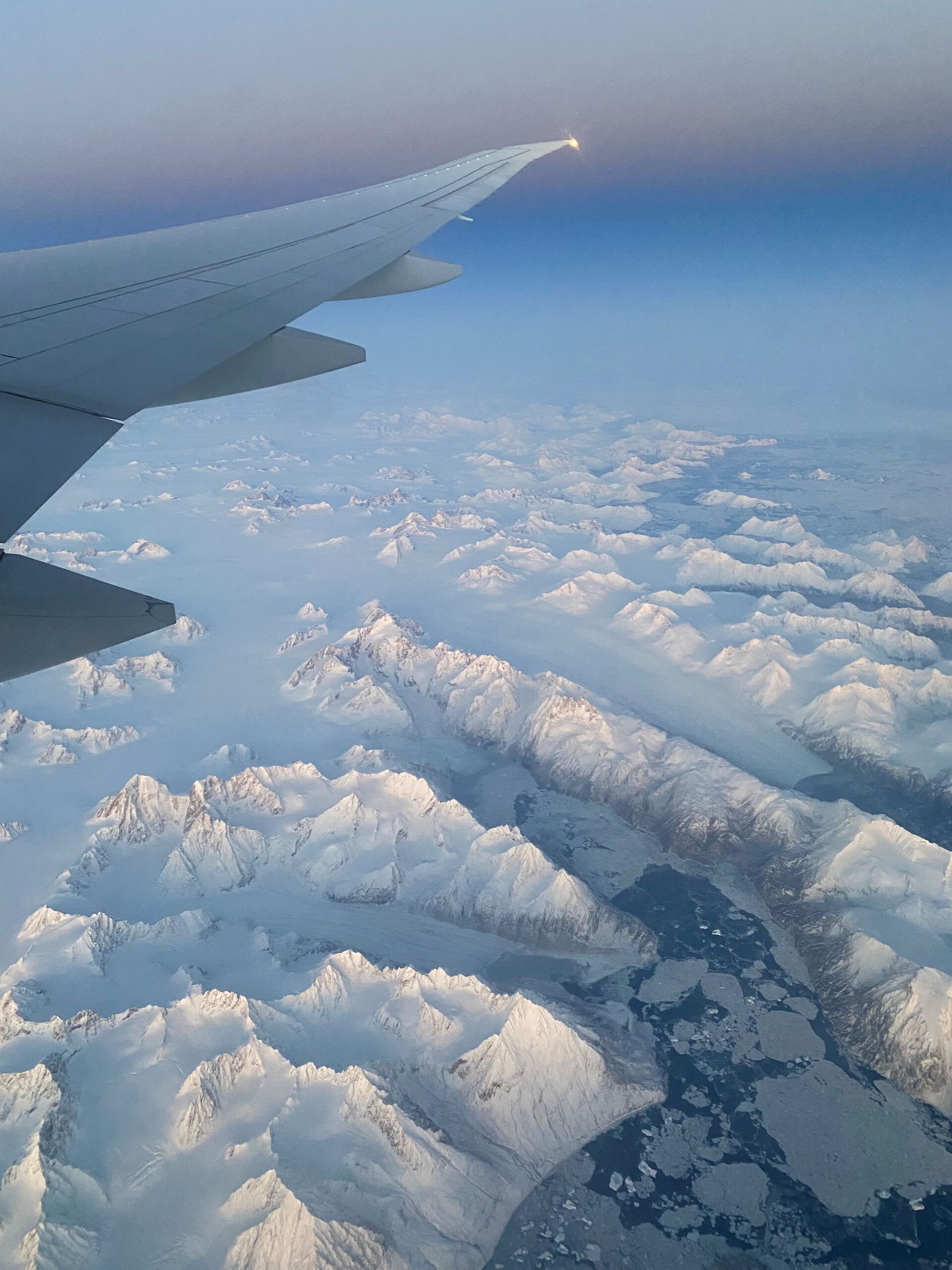 The southeast coast of Greenland between the Helheim and Kangerlussuaq glaciers (the Ikersuaq Fjord is in the foreground). Photo: Clint Conrad