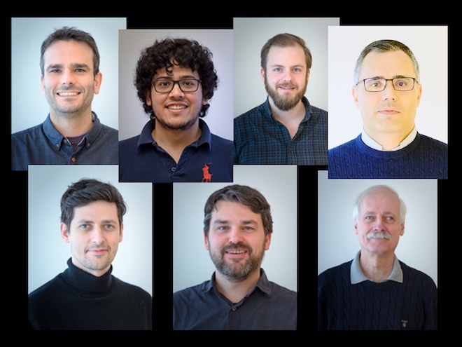 Seven male scientists in different ages