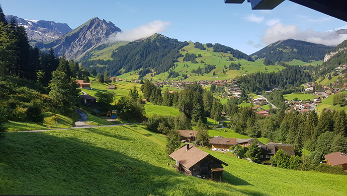 Image may contain: Sky, Cloud, Mountain, Plant, Green.