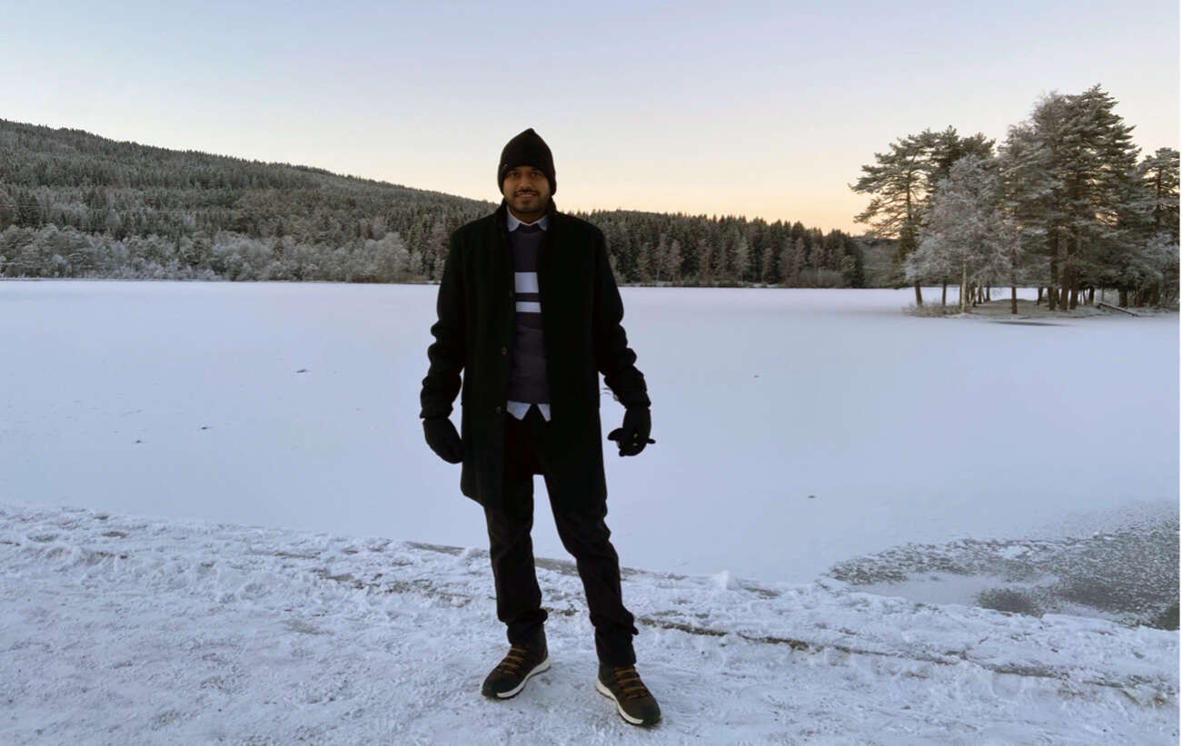 Young man at Sognsvann lake in December.